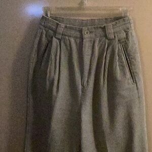 Light gray corduroys with pleats.